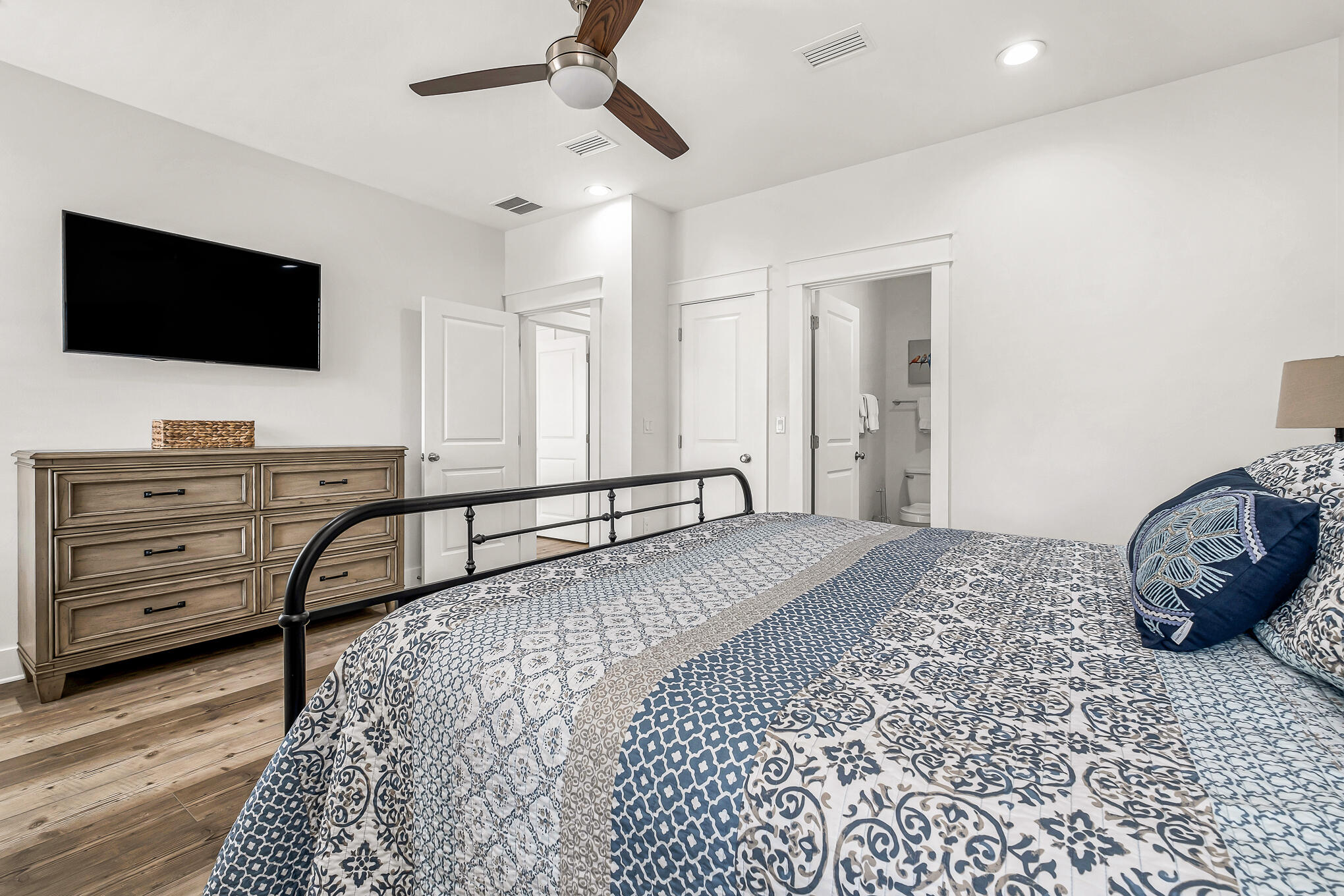 80 Sunfish Street Destin, FL 32541 - Photo 47 of 51 a bedroom with a bed and flat screen tv