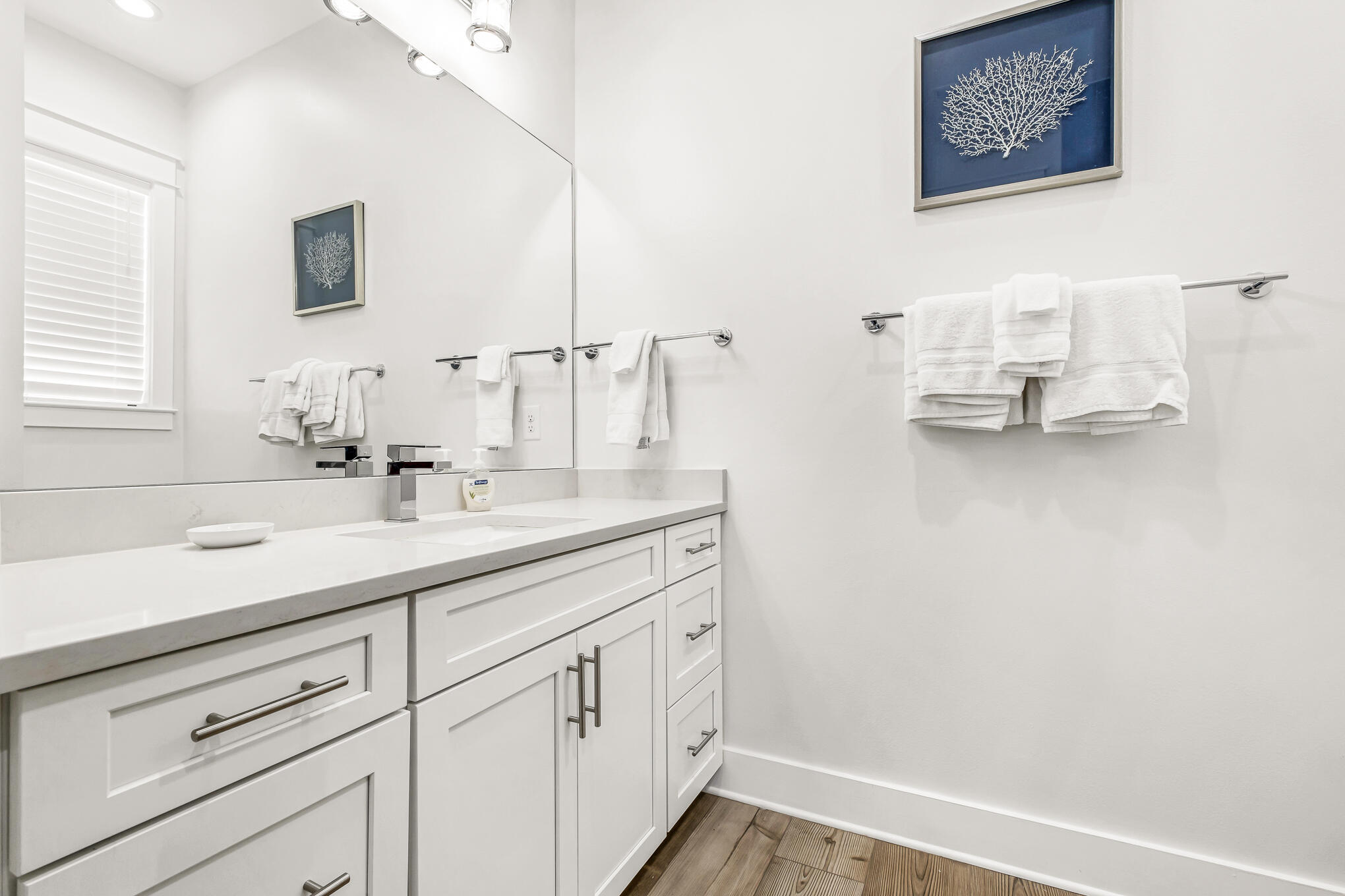 80 Sunfish Street Destin, FL 32541 - Photo 49 of 51 a bathroom with a sink and a mirror