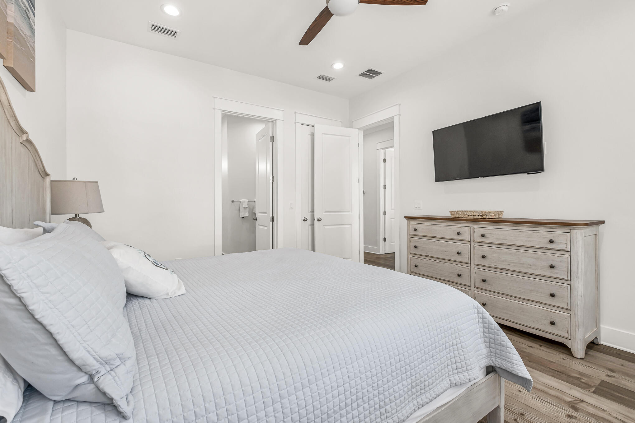 80 Sunfish Street Destin, FL 32541 - Photo 50 of 51 a bedroom with a bed and a flat screen tv