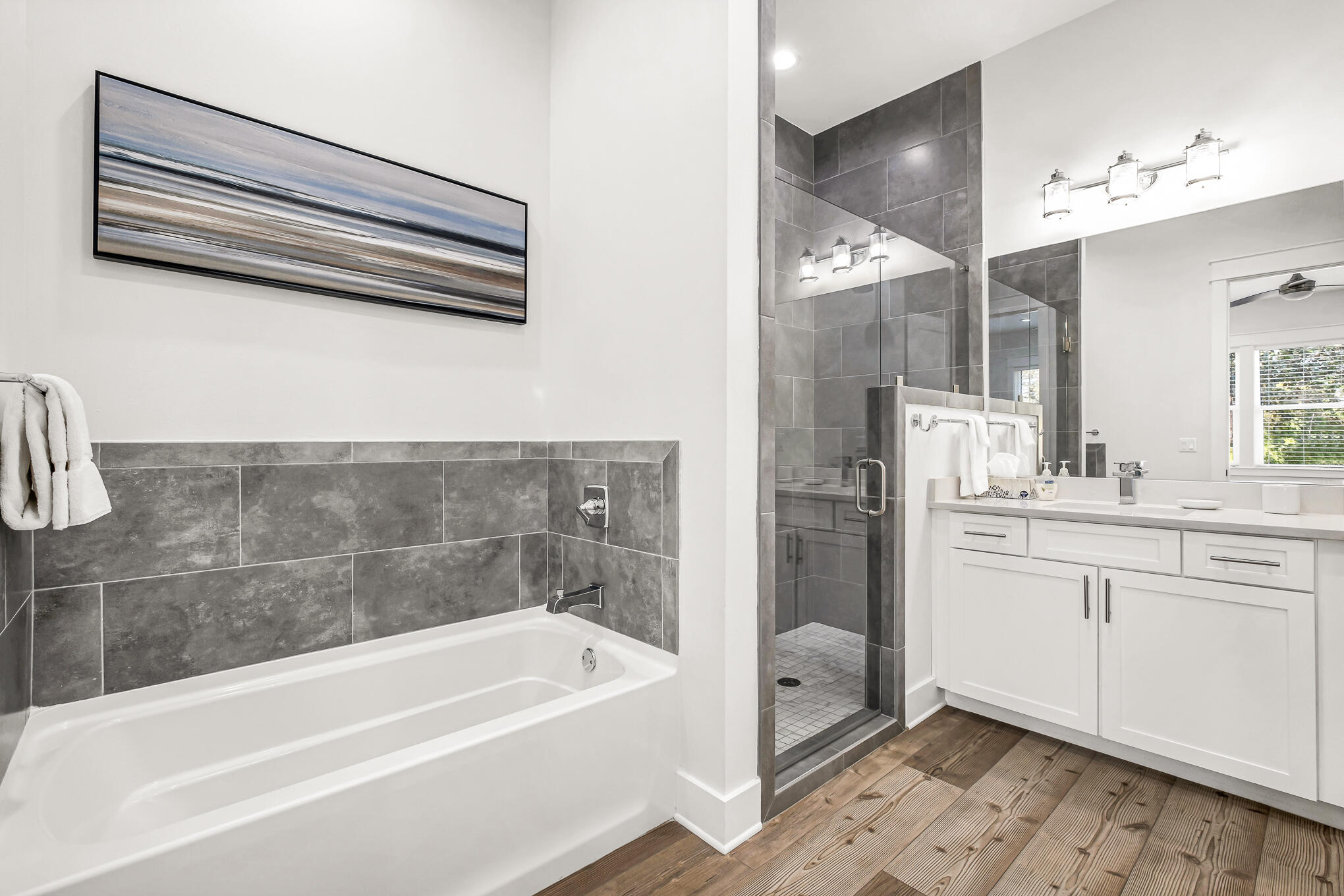 80 Sunfish Street Destin, FL 32541 - Photo 51 of 51 a bathroom with a tub a sink and mirrors