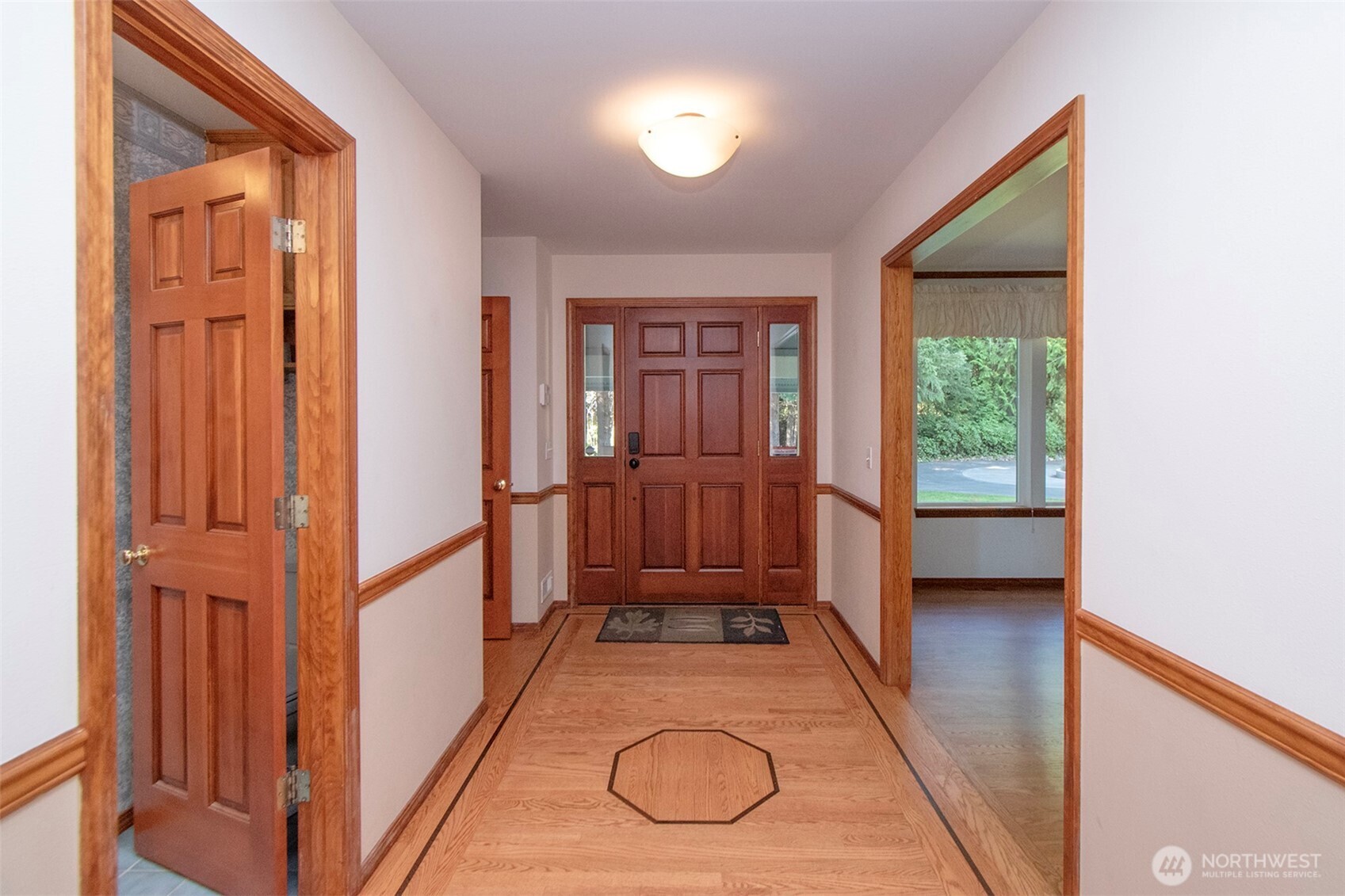 99 South Point Road Port Angeles, WA 98363 - Photo 3 of 40 a view of entryway with wooden floor