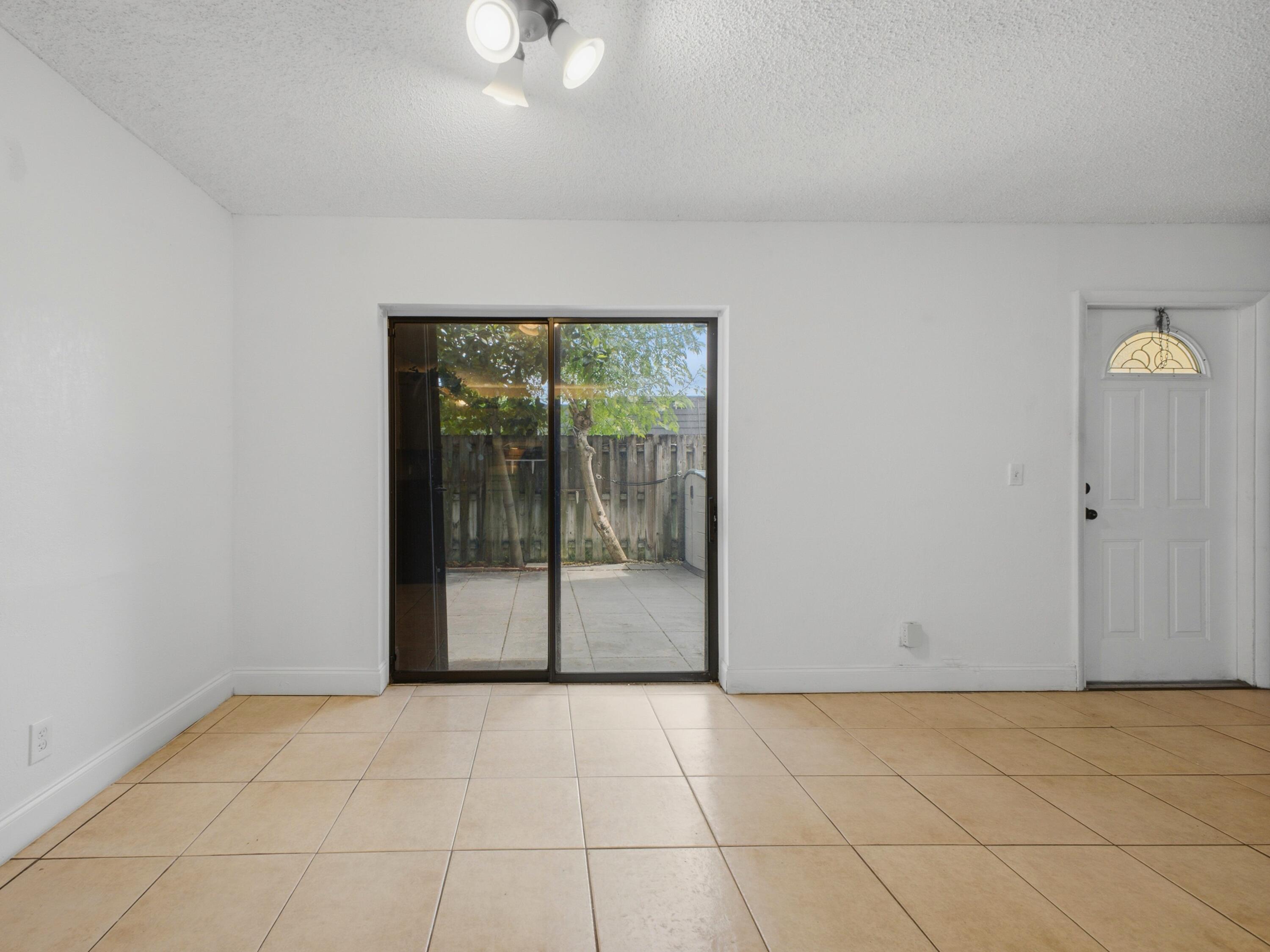 105 Woodland Road Palm Springs, FL 33461 - Photo 14 of 44 Dining Foyer