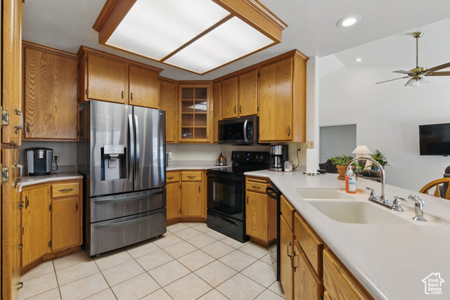 151 South Haulage Road Eureka, UT 84628 - Photo 13 of 36 Kitchen featuring black appliances, light tile patterned floors, brown cabinets, and recessed lighting