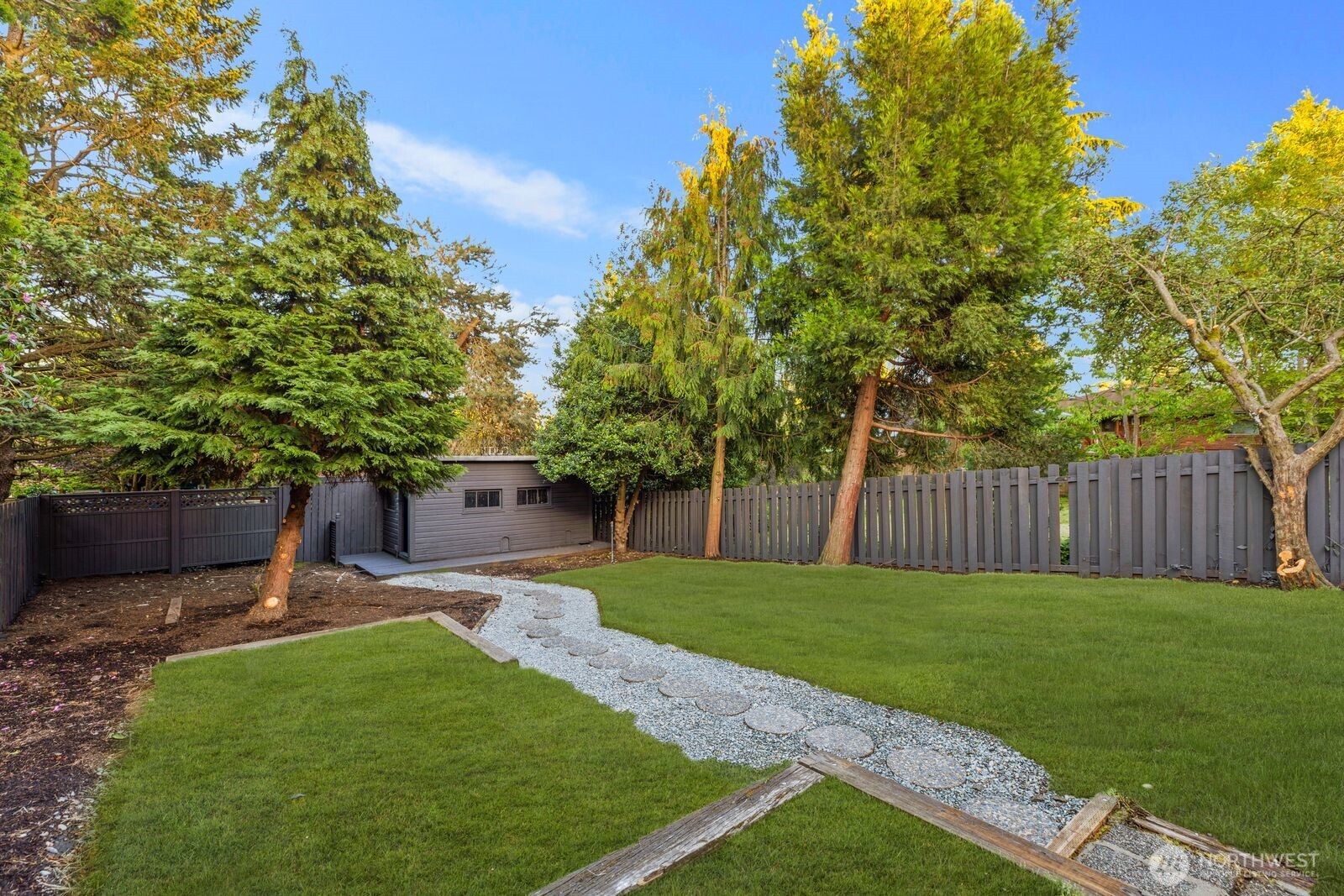 8216 Interlake Avenue North Seattle, WA 98103 - Photo 27 of 36 a view of a backyard with a garden
