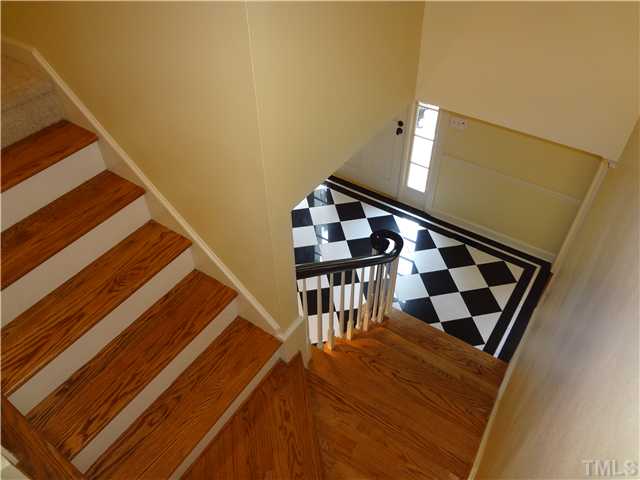 1604 Hunting Ridge Road Raleigh, NC 27615 - Photo 17 of 25 a view of entryway with wooden floor
