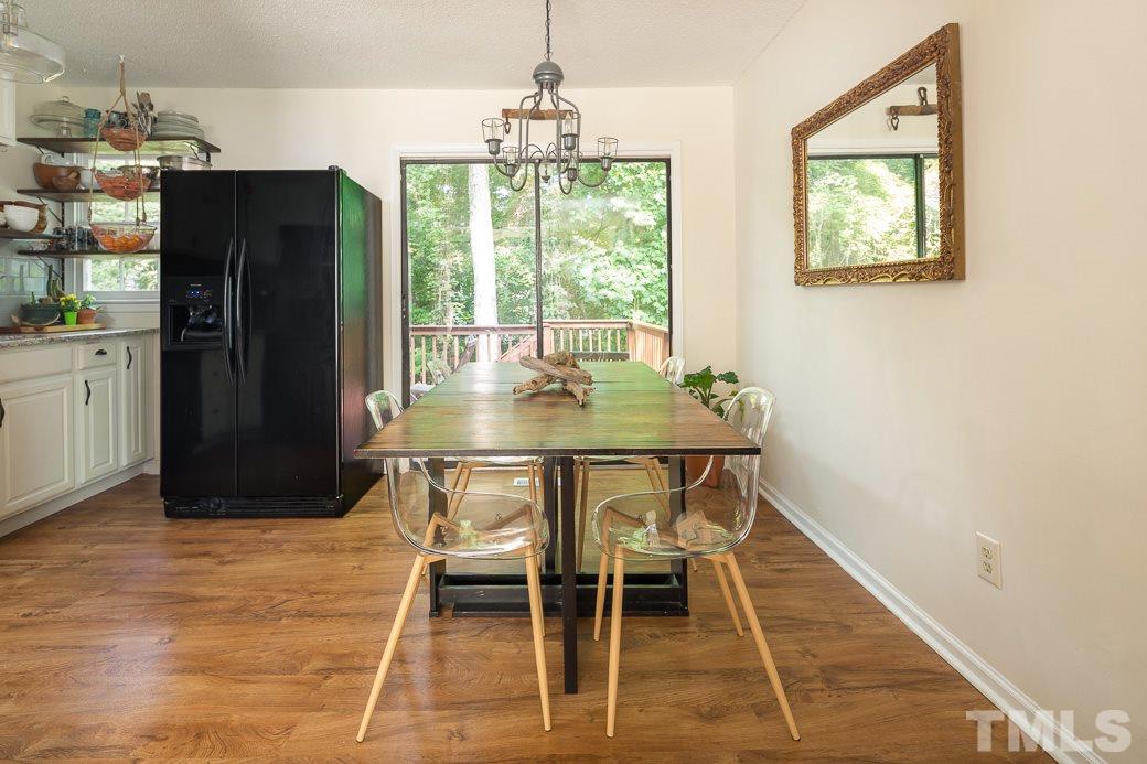 7625 Mine Valley Road Raleigh, NC 27615 - Photo 4 of 10 The breakfast area and Kitchen are open to the Family Room which has plenty of windows for NATURAL LIGHTING. There is room for a table for informal gatherings and cups of hot tea at the end of your day.
