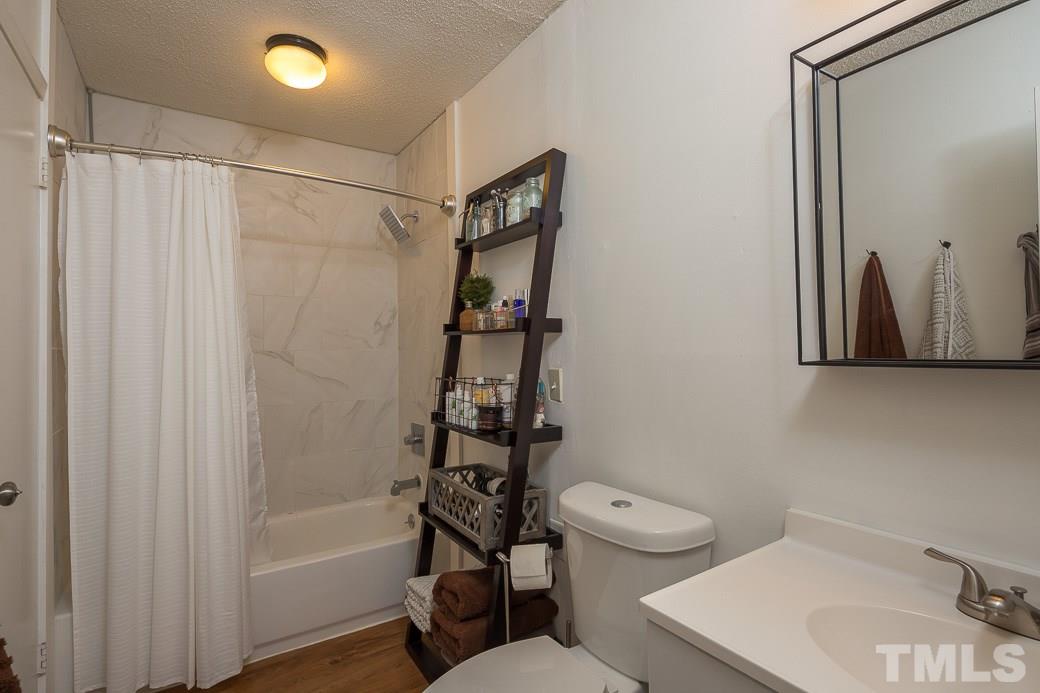7625 Mine Valley Road Raleigh, NC 27615 - Photo 6 of 10 This home's Master Bathroom was just fully renovated and is the perfect retreat after a long busy day! There's a gorgeous TILED shower with an OVERSIZED shower head and cool fixtures.