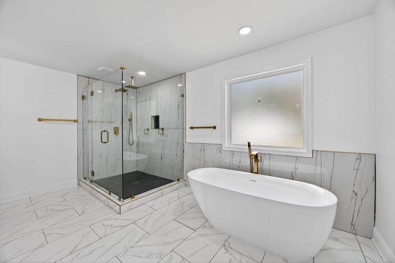 2177 Kipling Circle Southeast Atlanta, GA 30315 - Photo 18 of 27 a bathroom with a sink a toilet and shower
