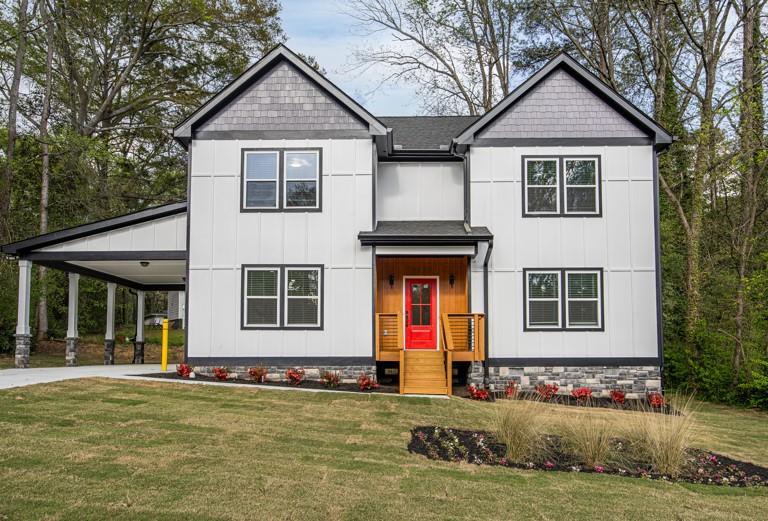 2177 Kipling Circle Southeast Atlanta, GA 30315 - Photo 2 of 27 a front view of a house with garage