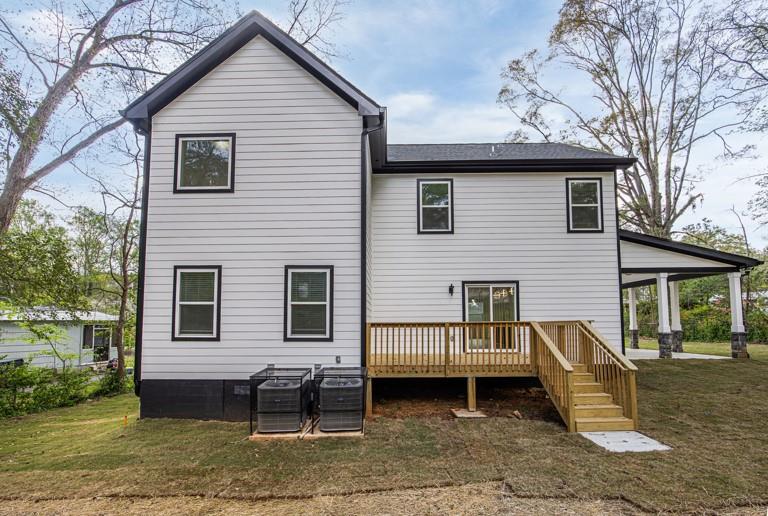 2177 Kipling Circle Southeast Atlanta, GA 30315 - Photo 5 of 27 a view of a house with a patio and a yard