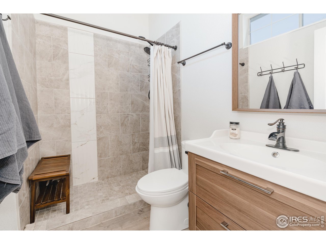 1601 West Swallow Road, Unit F Fort Collins, CO 80526 - Photo 9 of 30 Upgraded tile shower and newer vanity
