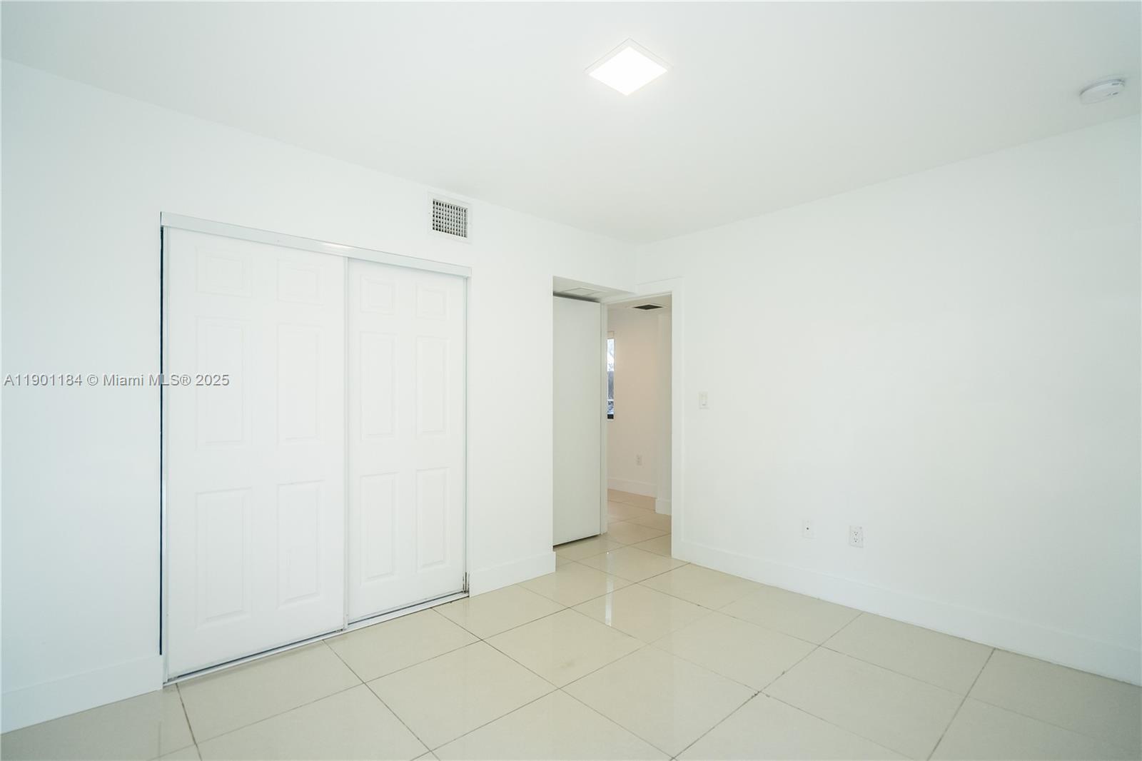 1985 Bay Drive, Unit 111 Miami Beach, FL 33141 - Photo 15 of 20 a view of an empty room