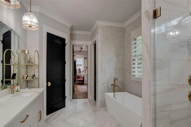 a view of a house with swimming pool and a yard