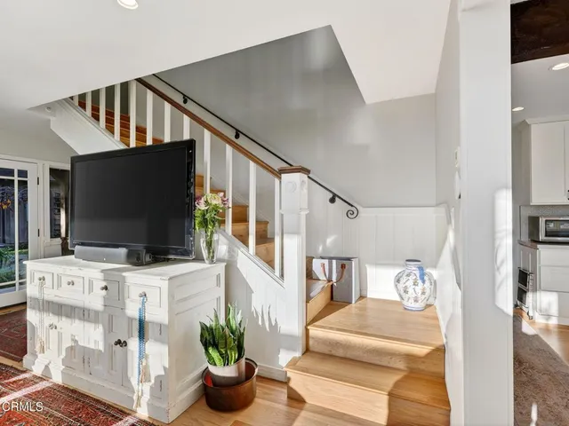 a view of entryway with wooden floor
