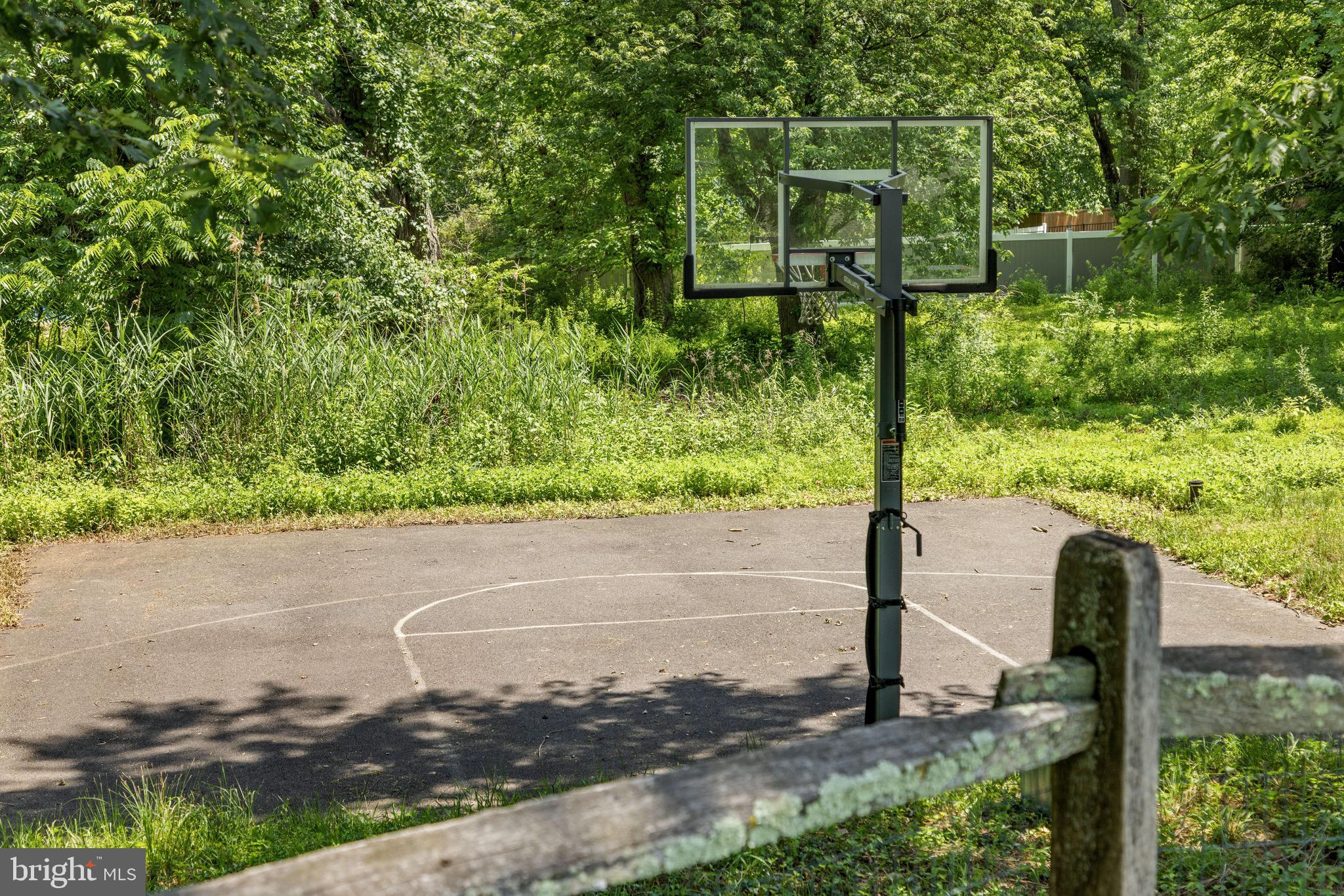 2297 Warwick Road Warrington, PA 18976 - Photo 59 of 64 basketball area with night lighting