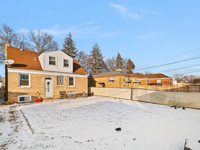 a view of a backyard with a patio