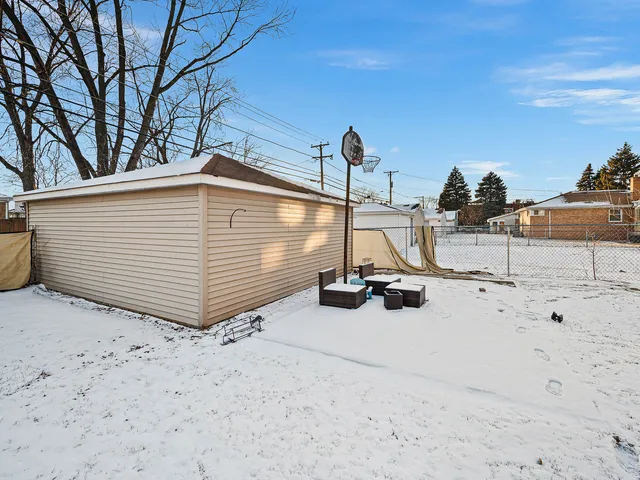 a view of a backyard of the house