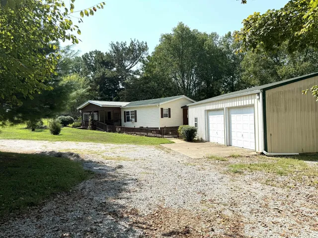 a house with yard in front of it