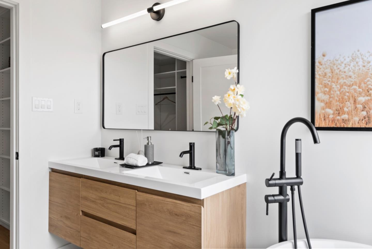 444 Manor Drive Pacifica, CA 94044 - Photo 20 of 70 a bathroom with a sink and a mirror