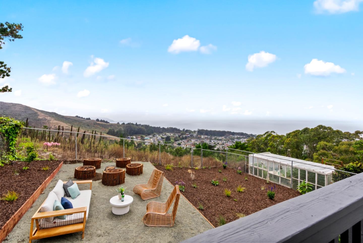 444 Manor Drive Pacifica, CA 94044 - Photo 29 of 70 a view of a terrace with lawn chairs and a potted plant