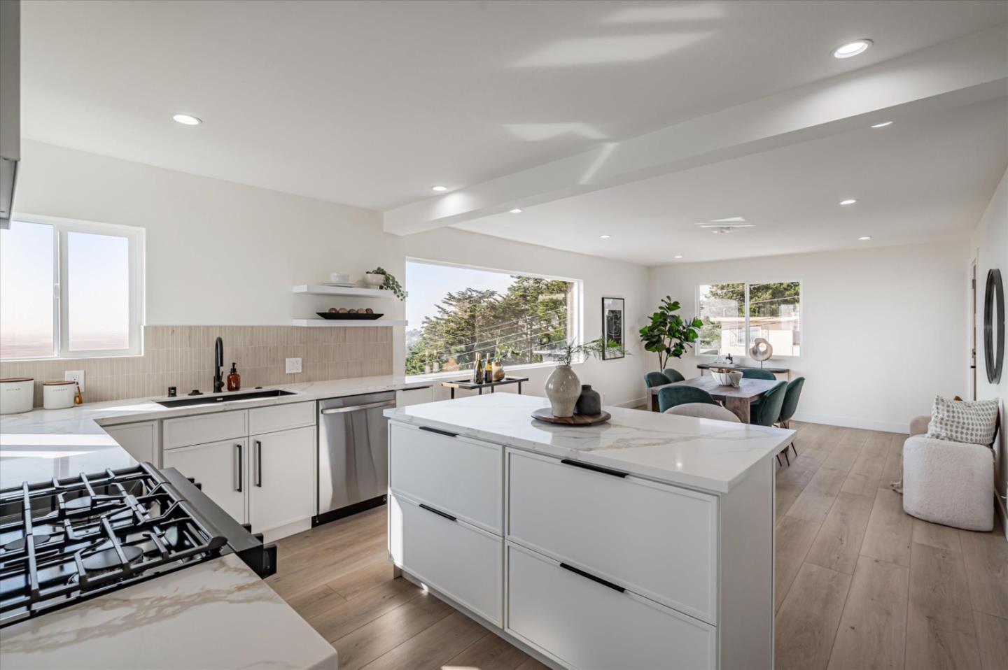 444 Manor Drive Pacifica, CA 94044 - Photo 53 of 70 a kitchen with sink stove and refrigerator