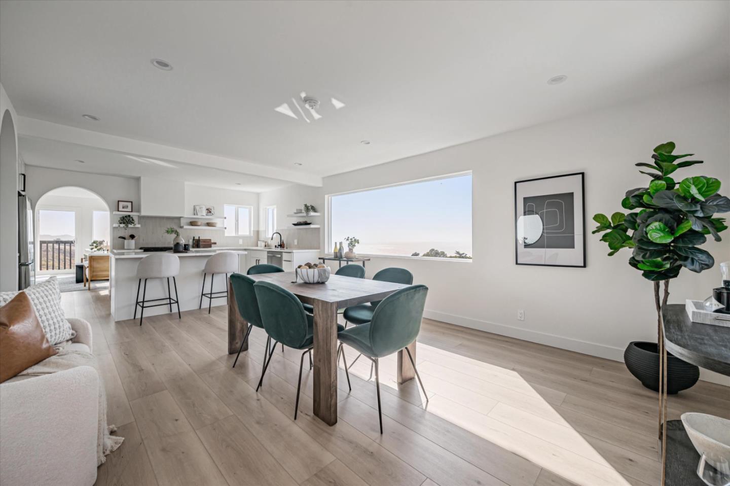 444 Manor Drive Pacifica, CA 94044 - Photo 56 of 70 a view of a dining room with furniture and wooden floor