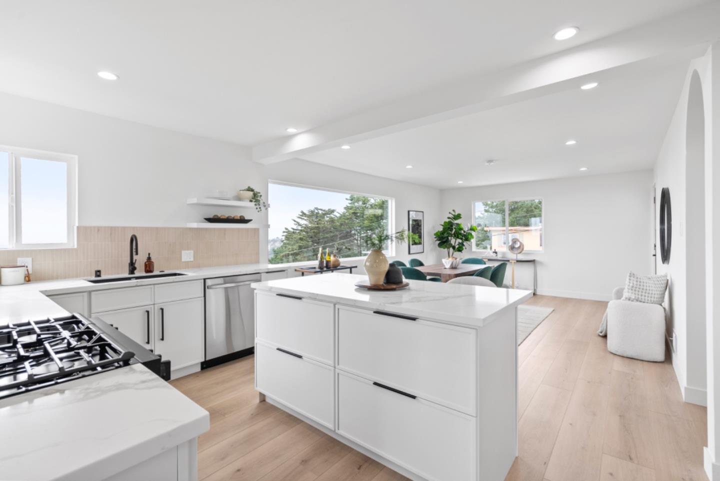 444 Manor Drive Pacifica, CA 94044 - Photo 9 of 70 a kitchen with sink a stove and cabinets
