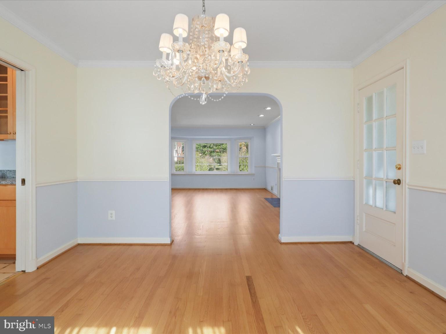 1002 Beverley Drive Alexandria, VA 22302 - Photo 12 of 46 wooden floor in an empty room with a window