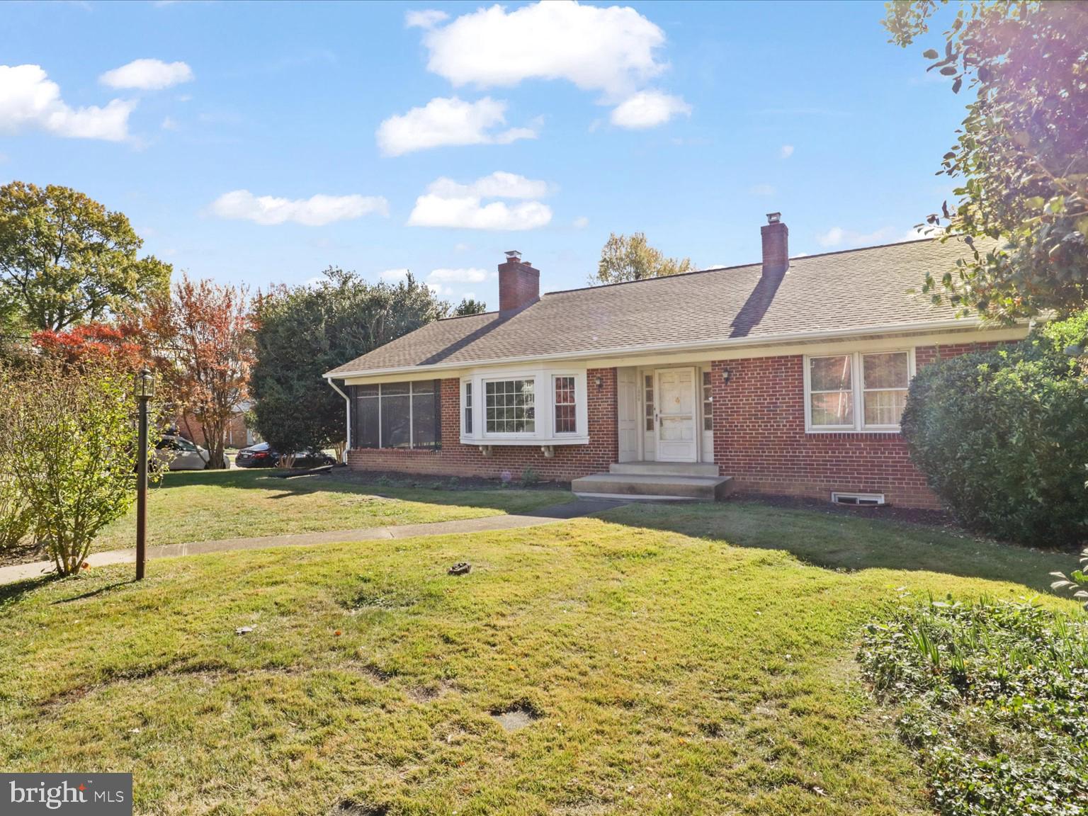 1002 Beverley Drive Alexandria, VA 22302 - Photo 2 of 46 a front view of a house with a yard
