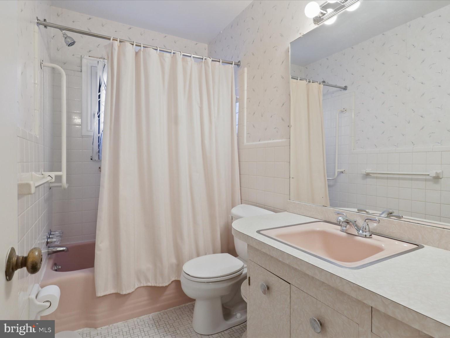 1002 Beverley Drive Alexandria, VA 22302 - Photo 30 of 46 a bathroom with a sink toilet and shower