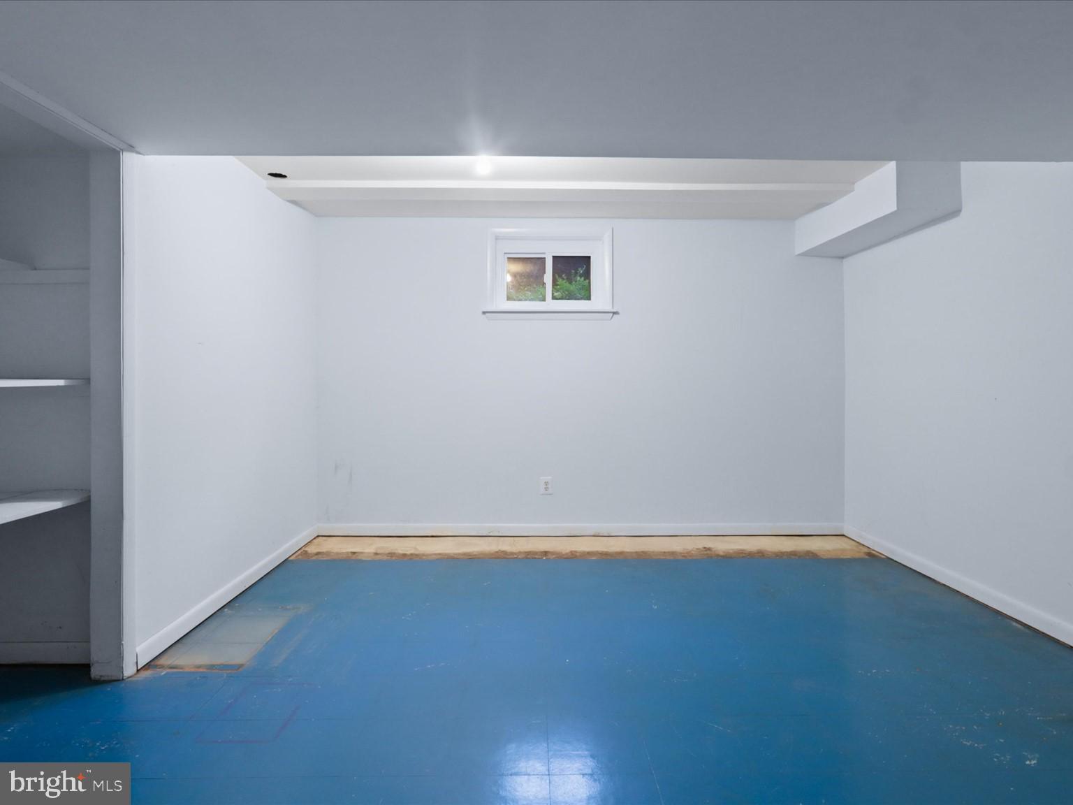 1002 Beverley Drive Alexandria, VA 22302 - Photo 33 of 46 a view of a small space with wooden floor and a window