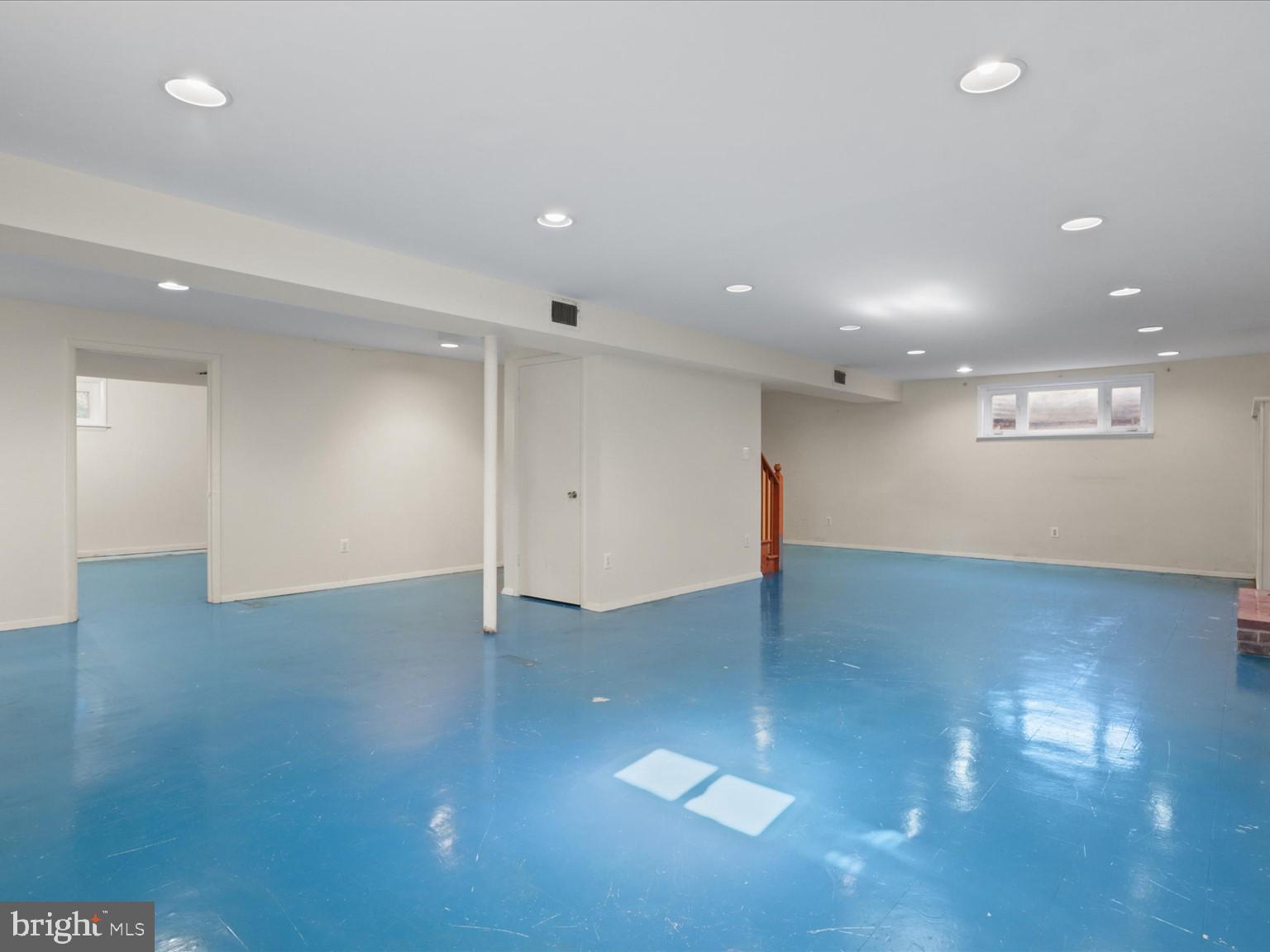1002 Beverley Drive Alexandria, VA 22302 - Photo 36 of 46 an empty room with wooden floor and windows