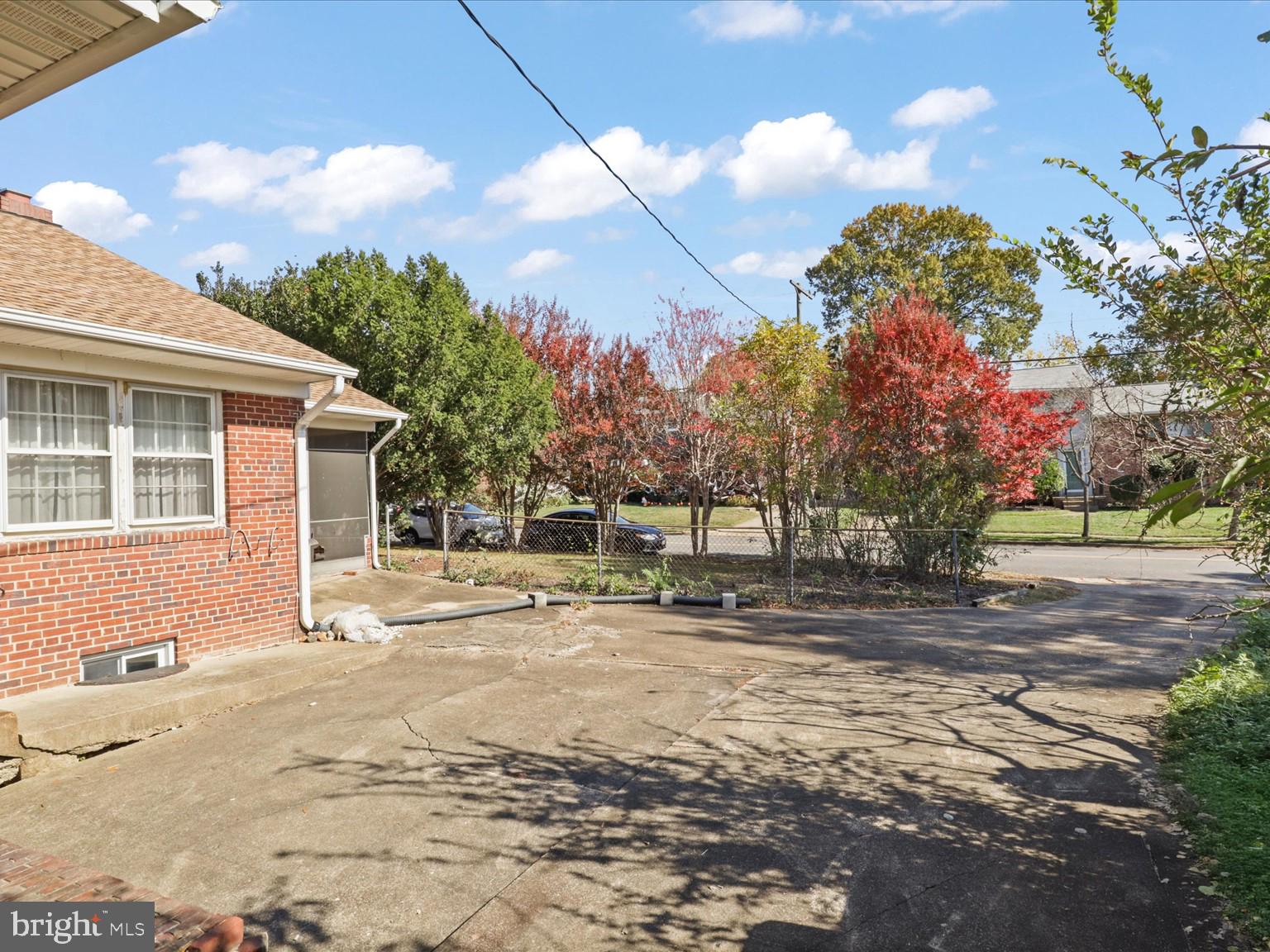 1002 Beverley Drive Alexandria, VA 22302 - Photo 44 of 46 a backyard of a house with table and chairs
