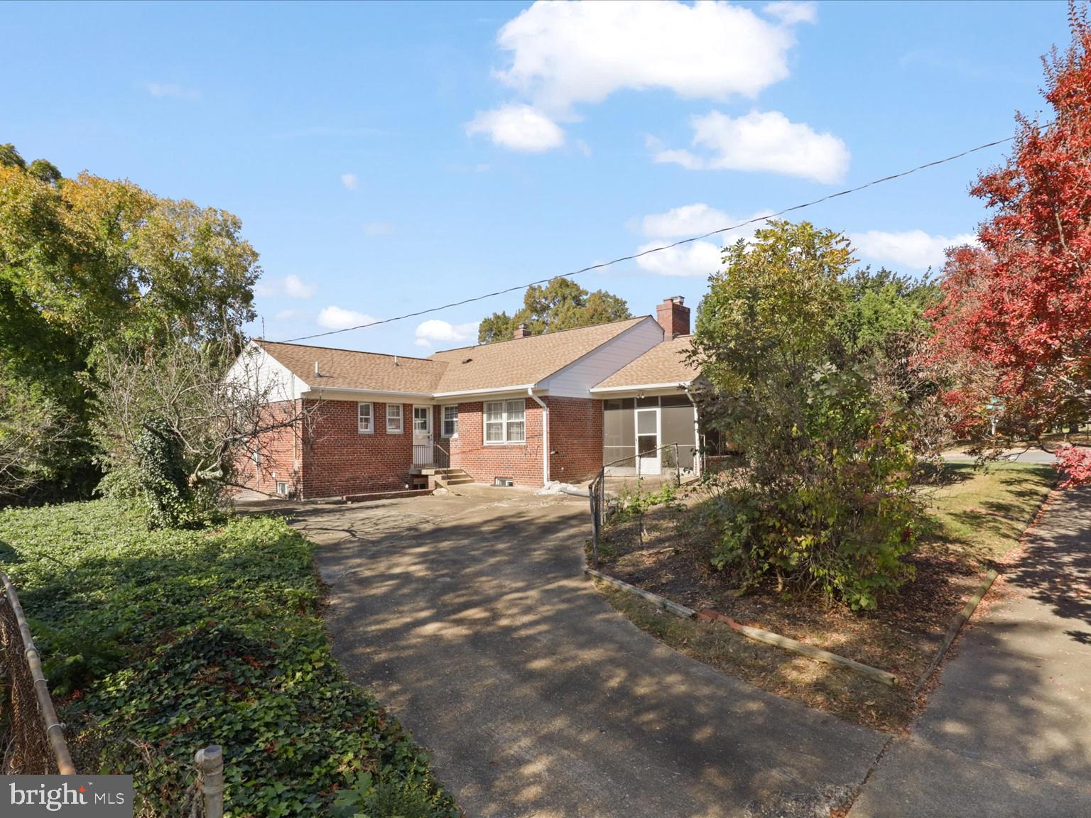 1002 Beverley Drive Alexandria, VA 22302 - Photo 45 of 46 a front view of a house with a yard