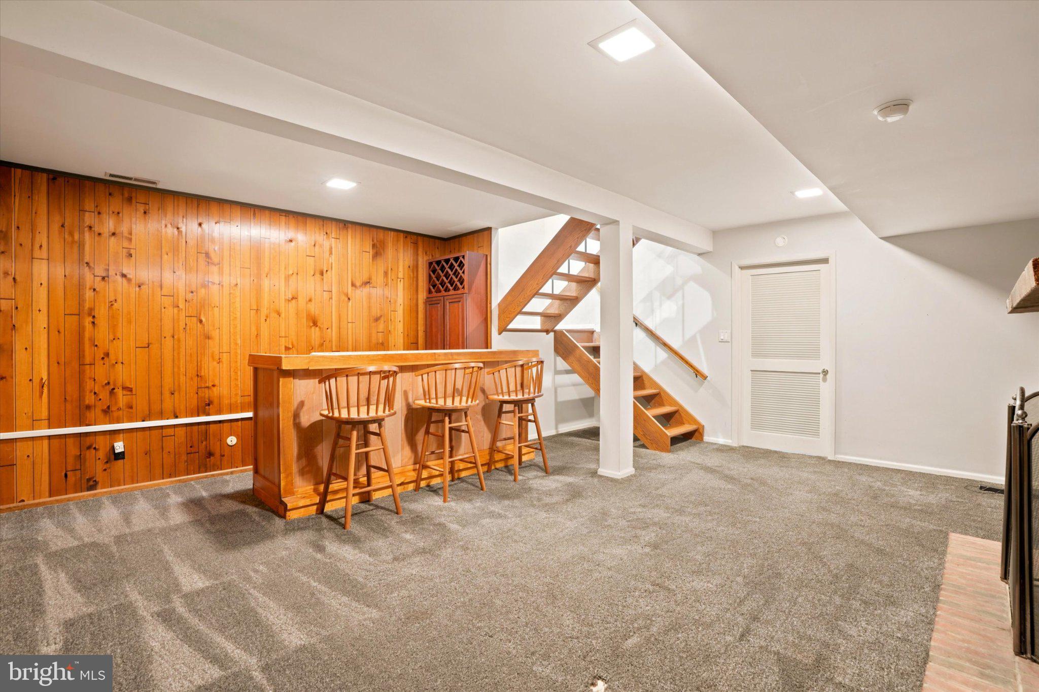 18 Medinah Drive Reading, PA 19607 - Photo 21 of 25 Cozy basement retreat with bar area.