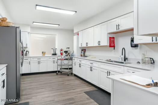 10220 East Apache Trail, Unit 223 Apache Junction, AZ 85120 - Photo 11 of 18 a kitchen with sink cabinets and window