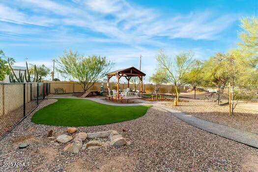10220 East Apache Trail, Unit 223 Apache Junction, AZ 85120 - Photo 14 of 18 a view of a garden