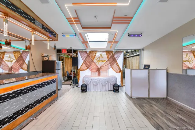 an entryway with wooden floor