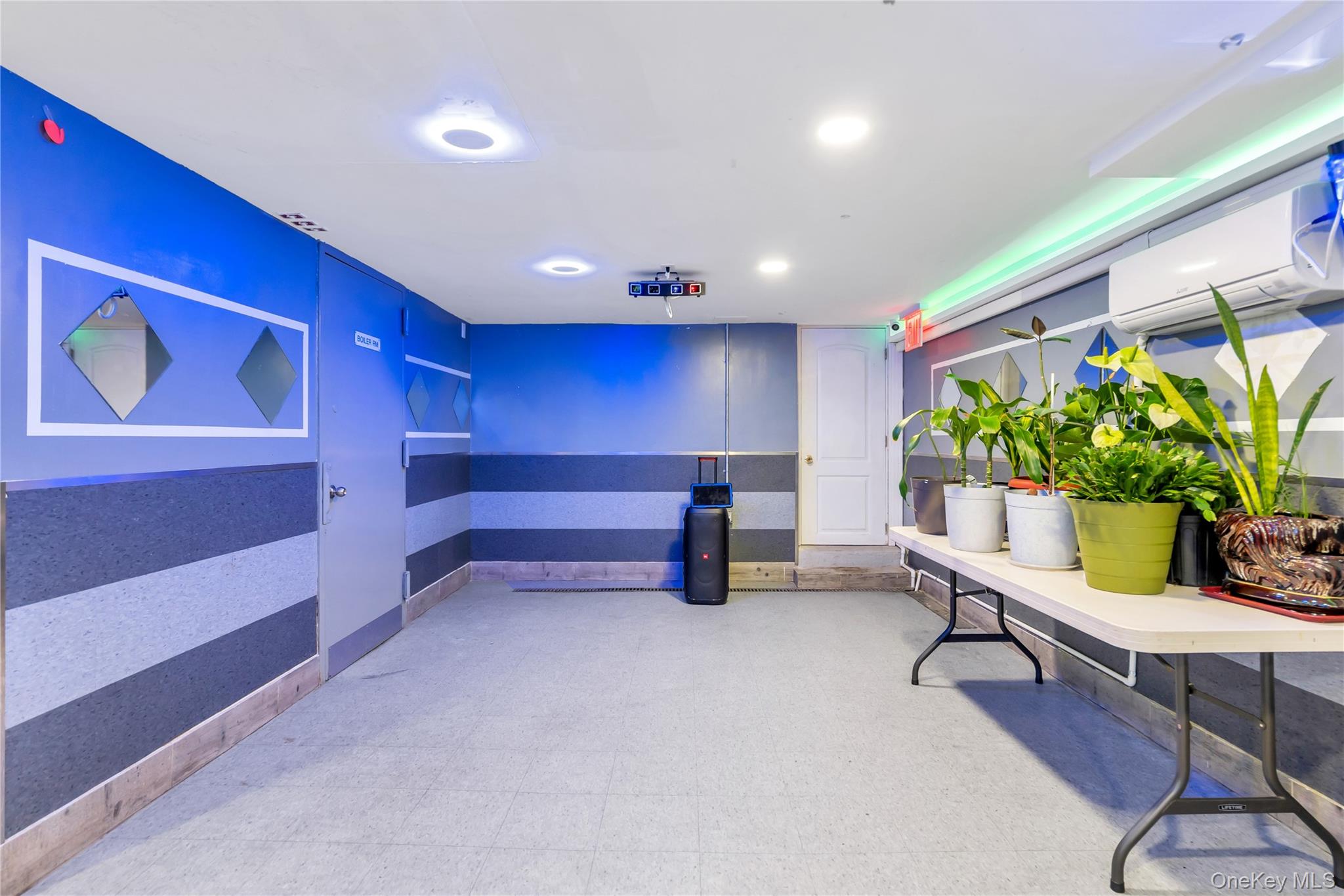 91-08 43rd Avenue Queens, NY 11373 - Photo 9 of 17 a room with wooden floor and furniture