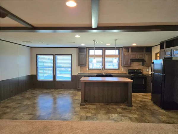 a living room with a couch and a television