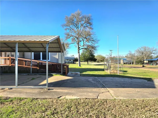 a view of a house with a swimming pool