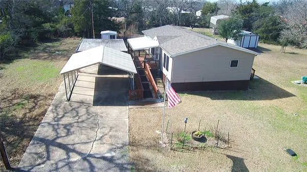 a picture of a table and chairs in the patio