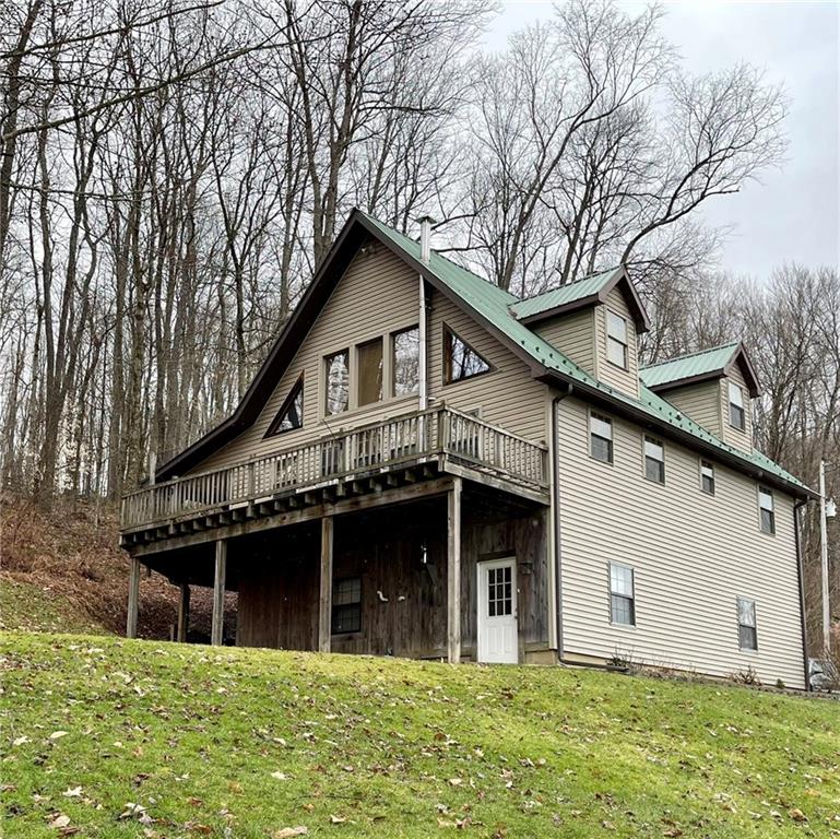 34030 State Rte 27 Guys Mills, PA 16327 - Photo 1 of 21 a view of a house with a yard