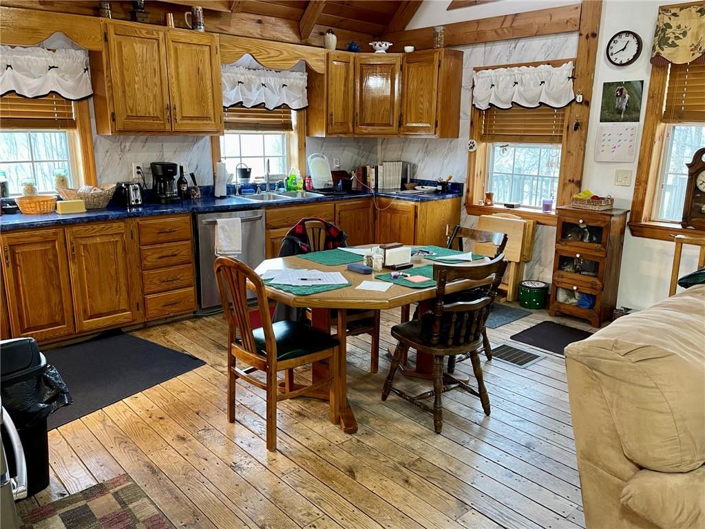 34030 State Rte 27 Guys Mills, PA 16327 - Photo 13 of 21 a view of a dining room with furniture and wooden floor