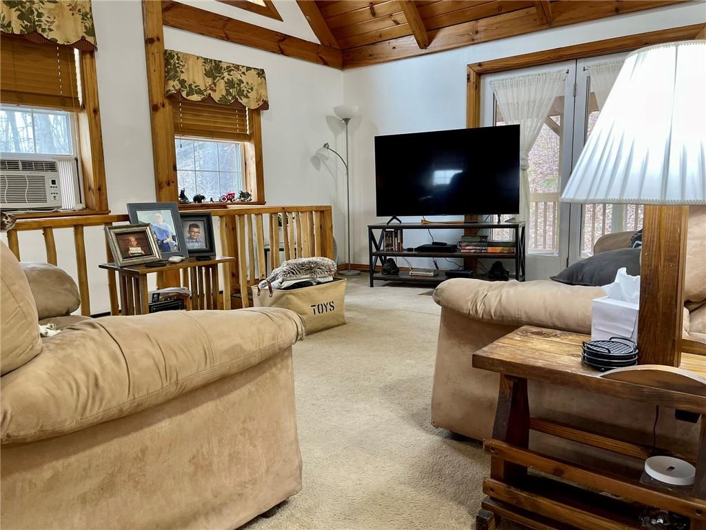 34030 State Rte 27 Guys Mills, PA 16327 - Photo 17 of 21 a living room with furniture and a flat screen tv