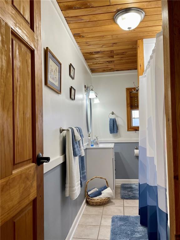 34030 State Rte 27 Guys Mills, PA 16327 - Photo 18 of 21 a bathroom with a sink and mirror