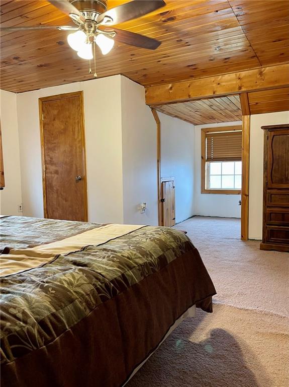 34030 State Rte 27 Guys Mills, PA 16327 - Photo 19 of 21 a bedroom with a bed and a chandelier
