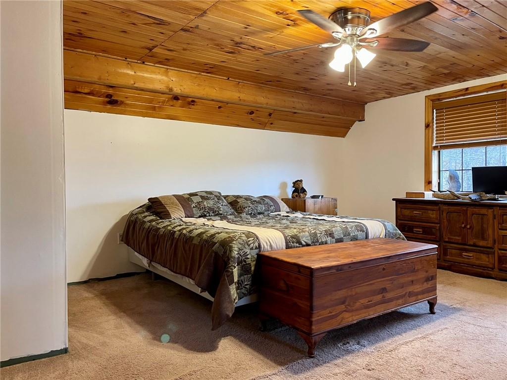 34030 State Rte 27 Guys Mills, PA 16327 - Photo 10 of 21 a bedroom with a bed and ceiling fan