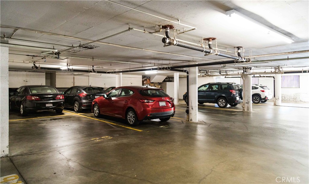8740 Tuscany Avenue Playa del Rey, CA 90293 - Photo 18 of 21 a view of cars parked in a parking