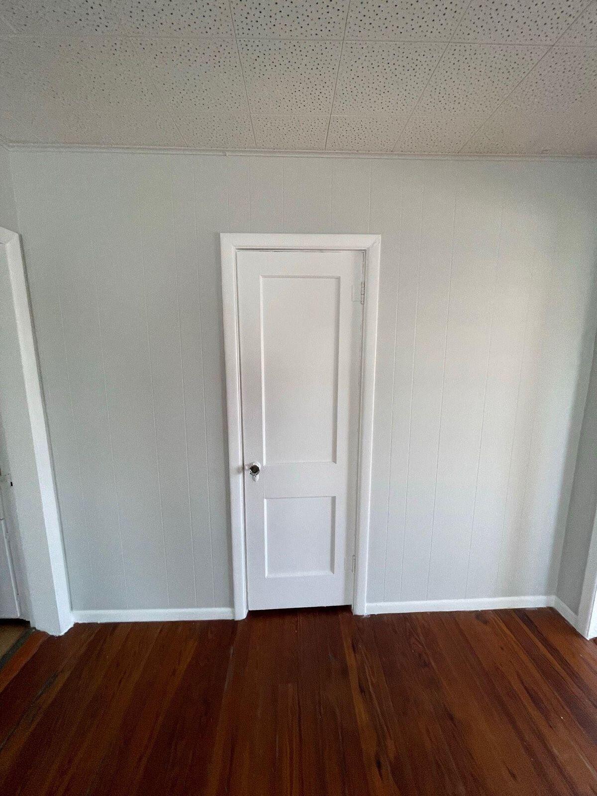 736 Omar Road, Unit 1 West Palm Beach, FL 33405 - Photo 12 of 25 a view of an empty room and wooden floor